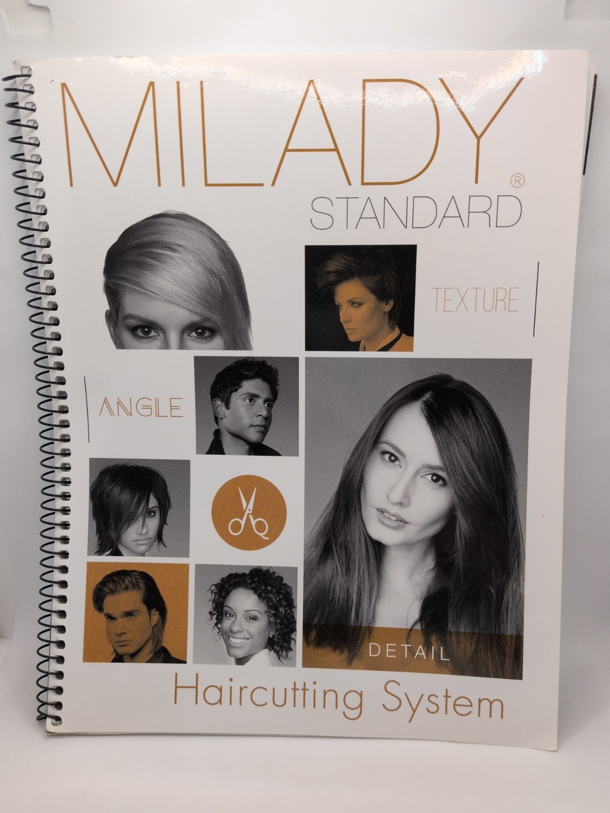 Milady Standard Haircutting System, Spiral bound Version by Milady